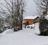 Chalet sous la neige